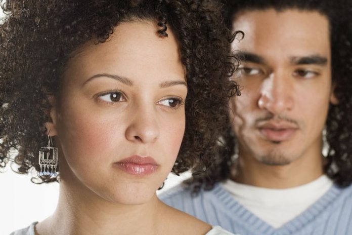 closeup-of-a-serious-couple-79253214-5b1d1313eb97de003630b95d