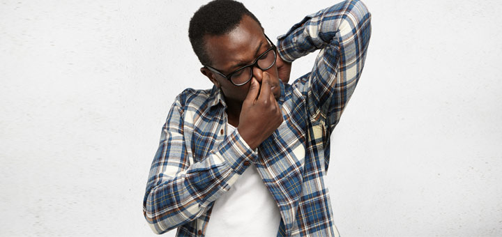 Why You Have Body Ordour And How To Treat It 2 black man smelling pits