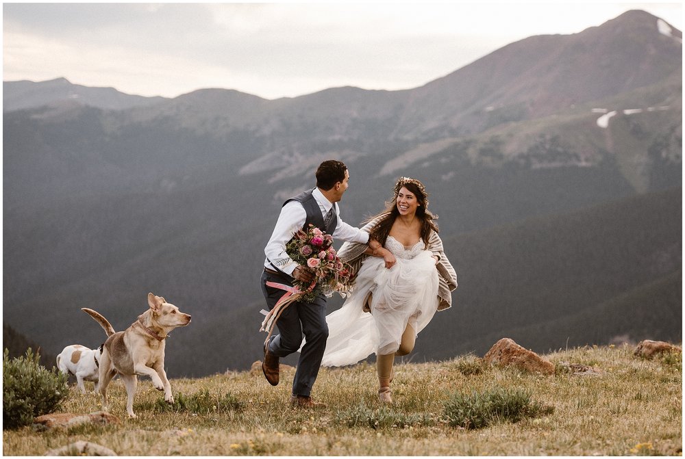 bride groom run mountain top wedding pictures with dog eloping ideas