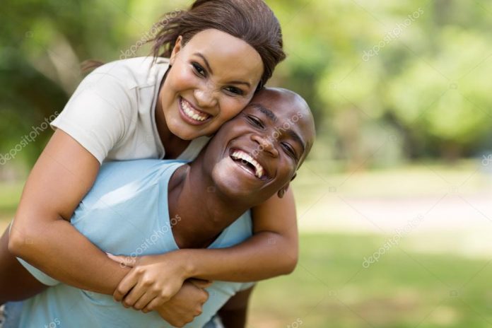 depositphotos_66099511-stock-photo-couple-piggybacking-outdoors