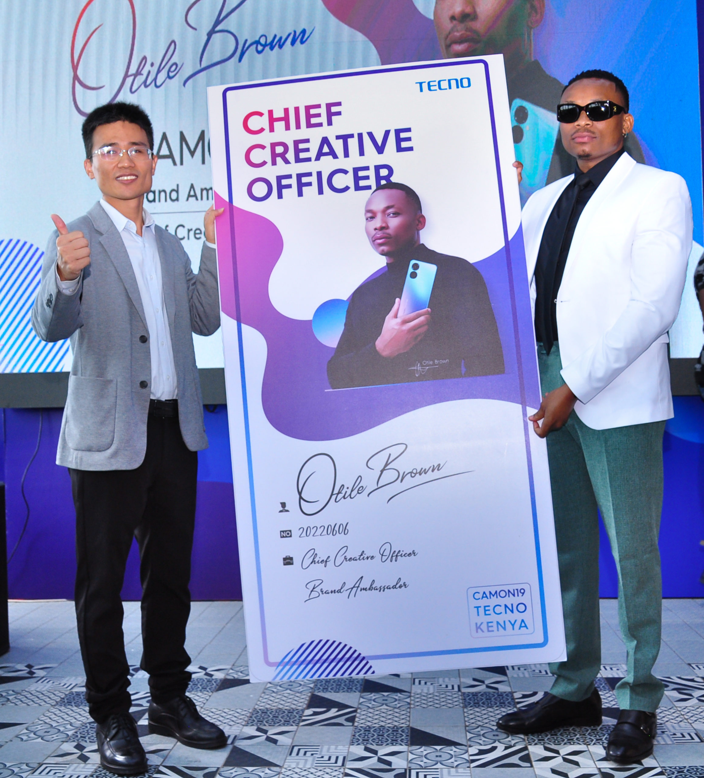 From Right Otile Brown and TECNO Mobile Kenya Brand Manager Peter Shi during his unveiling as the Chief Creative Officer for CAMON19 Series. scaled