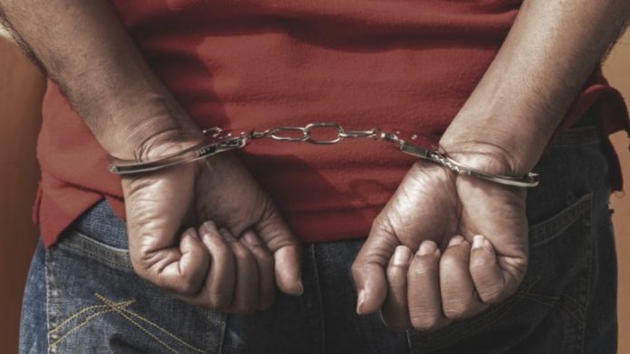 man-in-handcuffs-e1594107112609.jpg