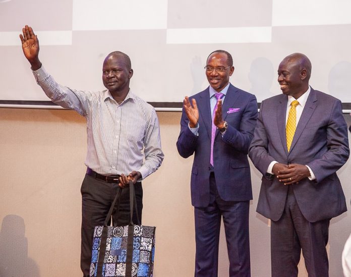 Dalbit's longest serving employee of 14 years, Abraham Chol, with Humphrey Kariuki and DP Rigathi Gachagua .jpg Dalbit