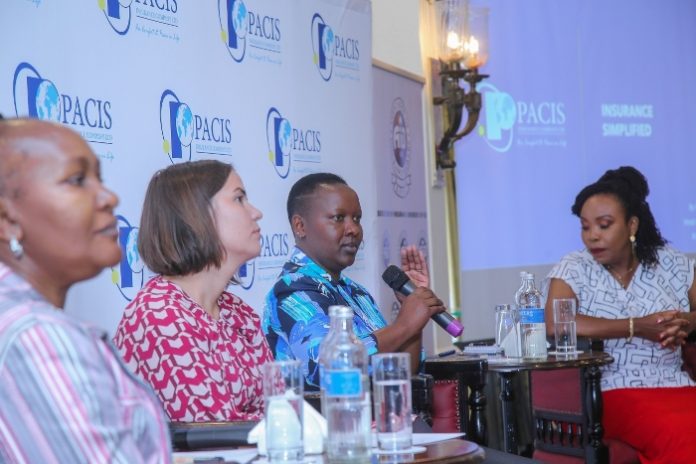 Pacis MD addresses women at the meeting (1) digitalization