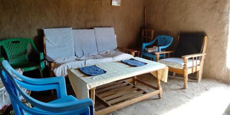 The interior of the traditional mud hut Airbnb in Siaya County